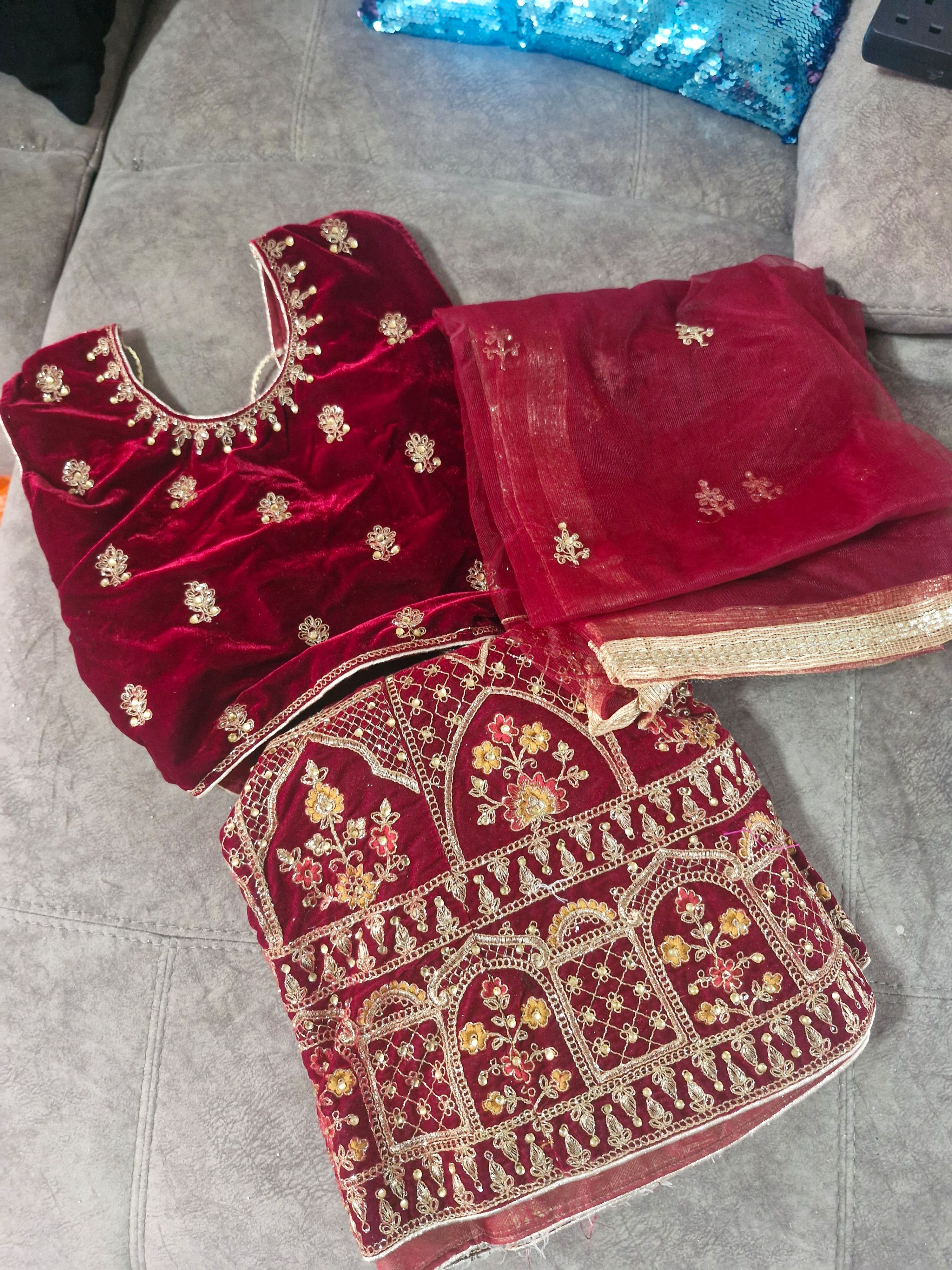 Stunning Maroon Velvet Lehenga Choli with Intricate Gold Zari and Sequin Embroidery
