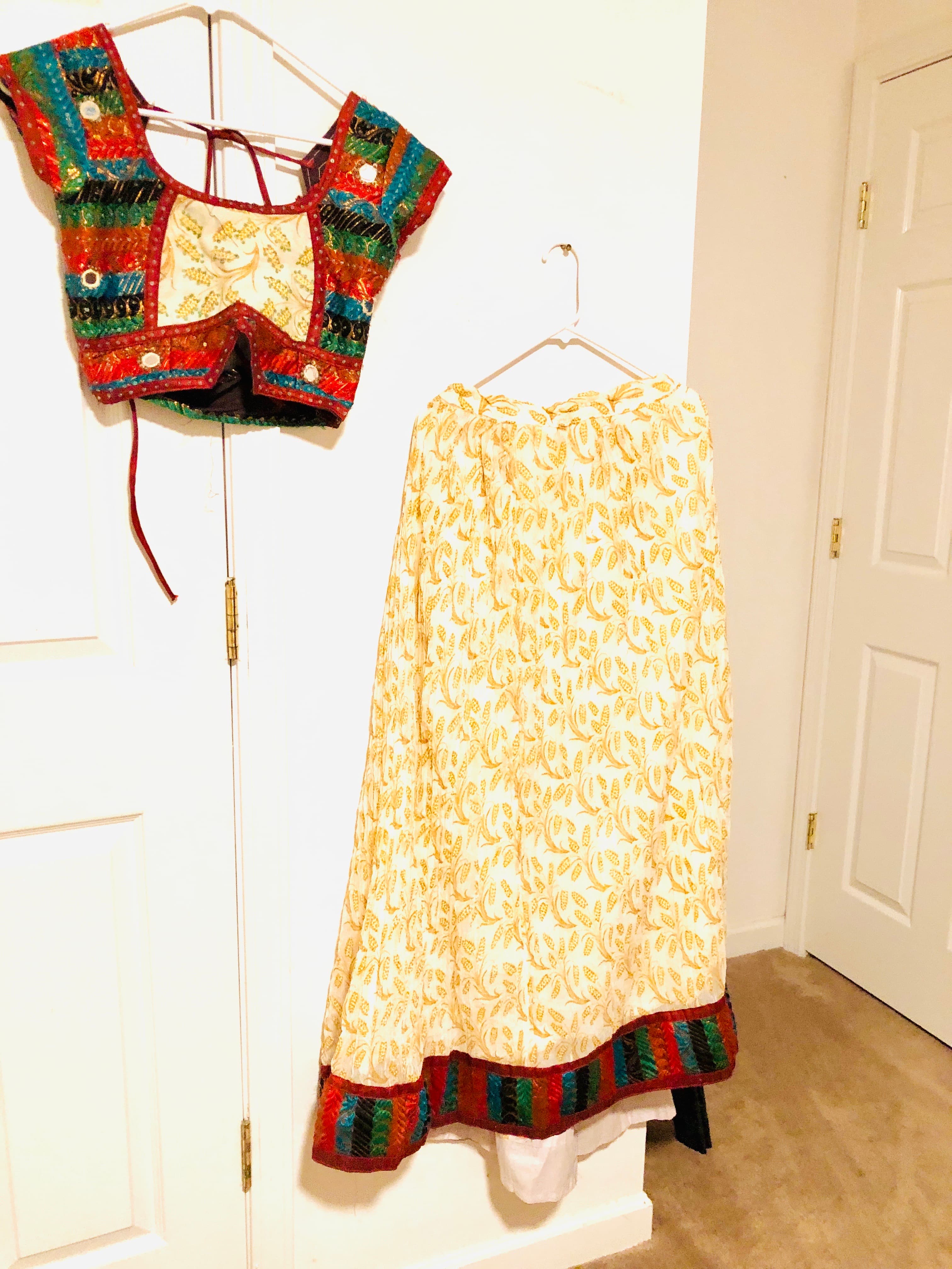 Vibrant Cream and Gold Embroidered Lehenga Skirt with Multi-Color Blouse