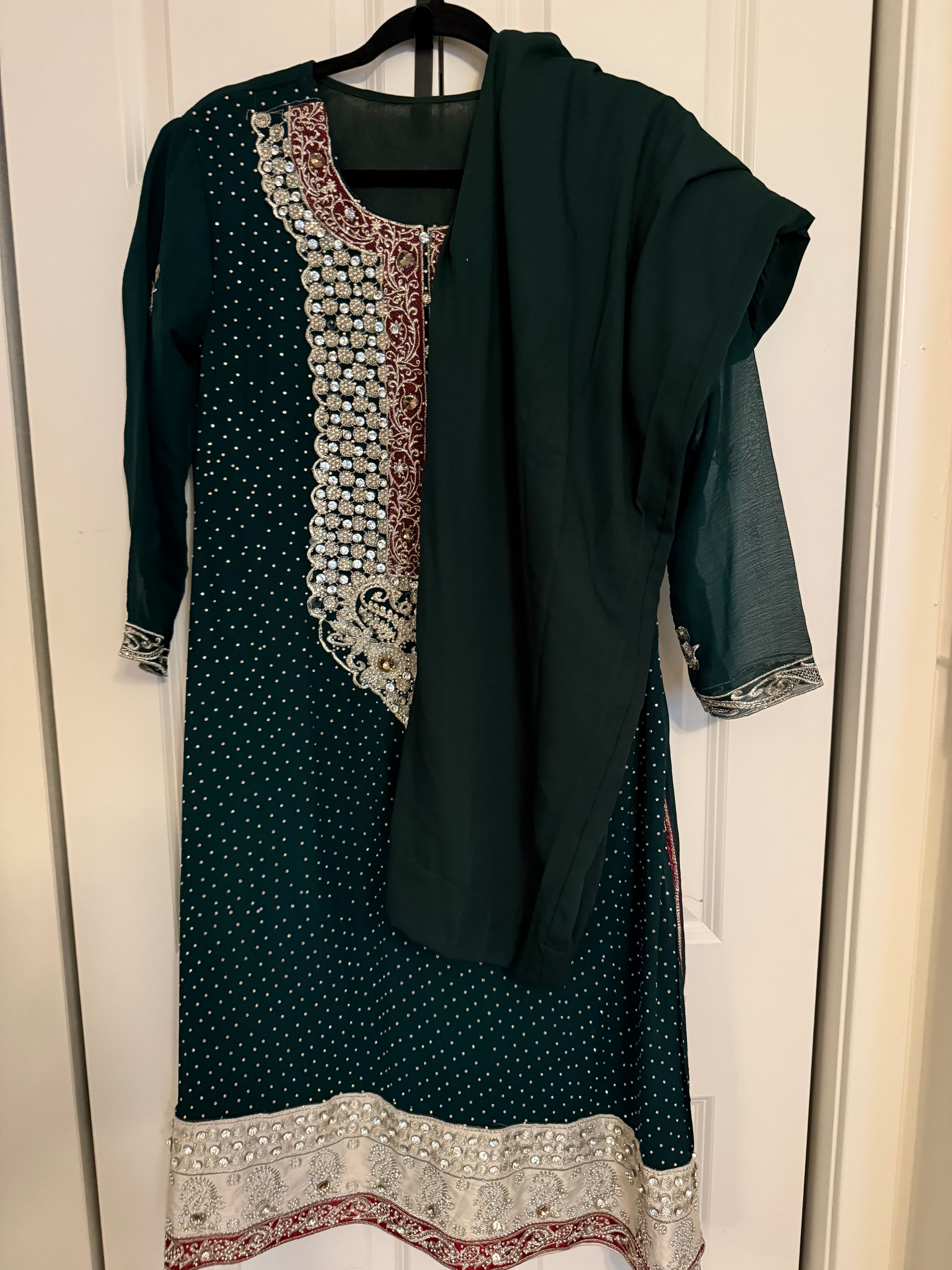 Elegant Dark Green Salwar Suit with Intricate Silver and Maroon Embroidery