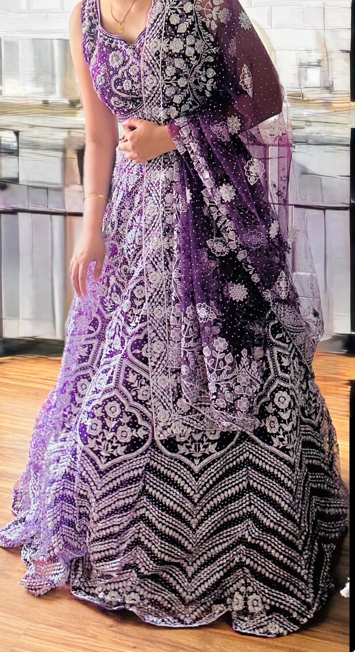 Stunning Purple Net Lehenga with Intricate Silver Sequin and Thread Work