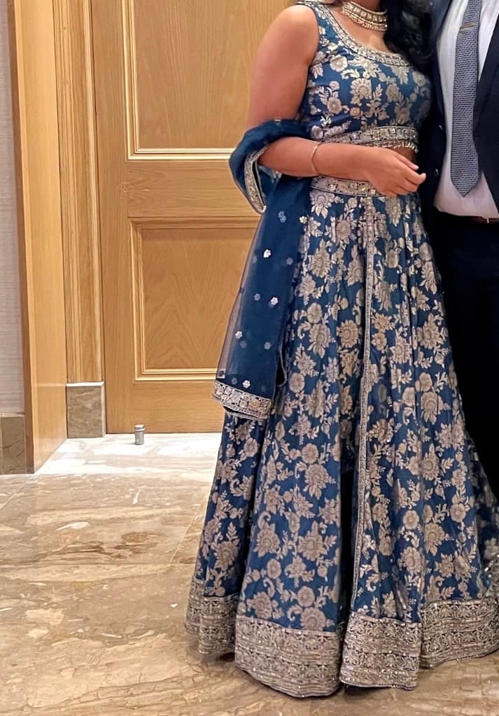 Stunning Teal Blue Brocade Lehenga with Gold Floral Weave and Sequin Border