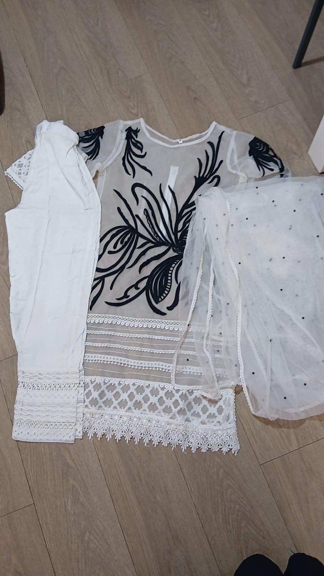Medium Size White 4 piece salwar kameez. Brand new without tags. Never worn. Would fit size 10-12.