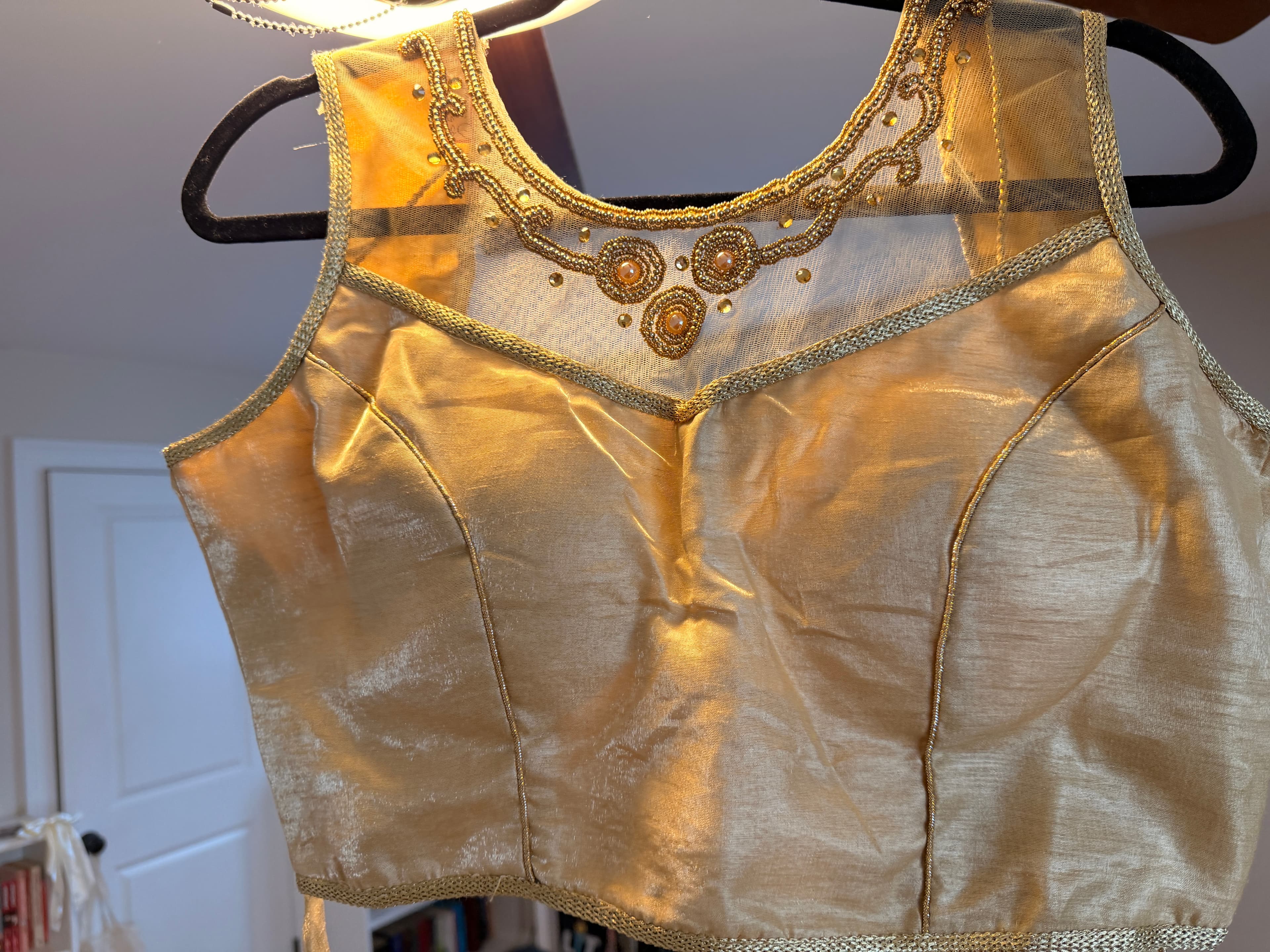 Elegant Gold Sleeveless Blouse with Beaded Net Yoke