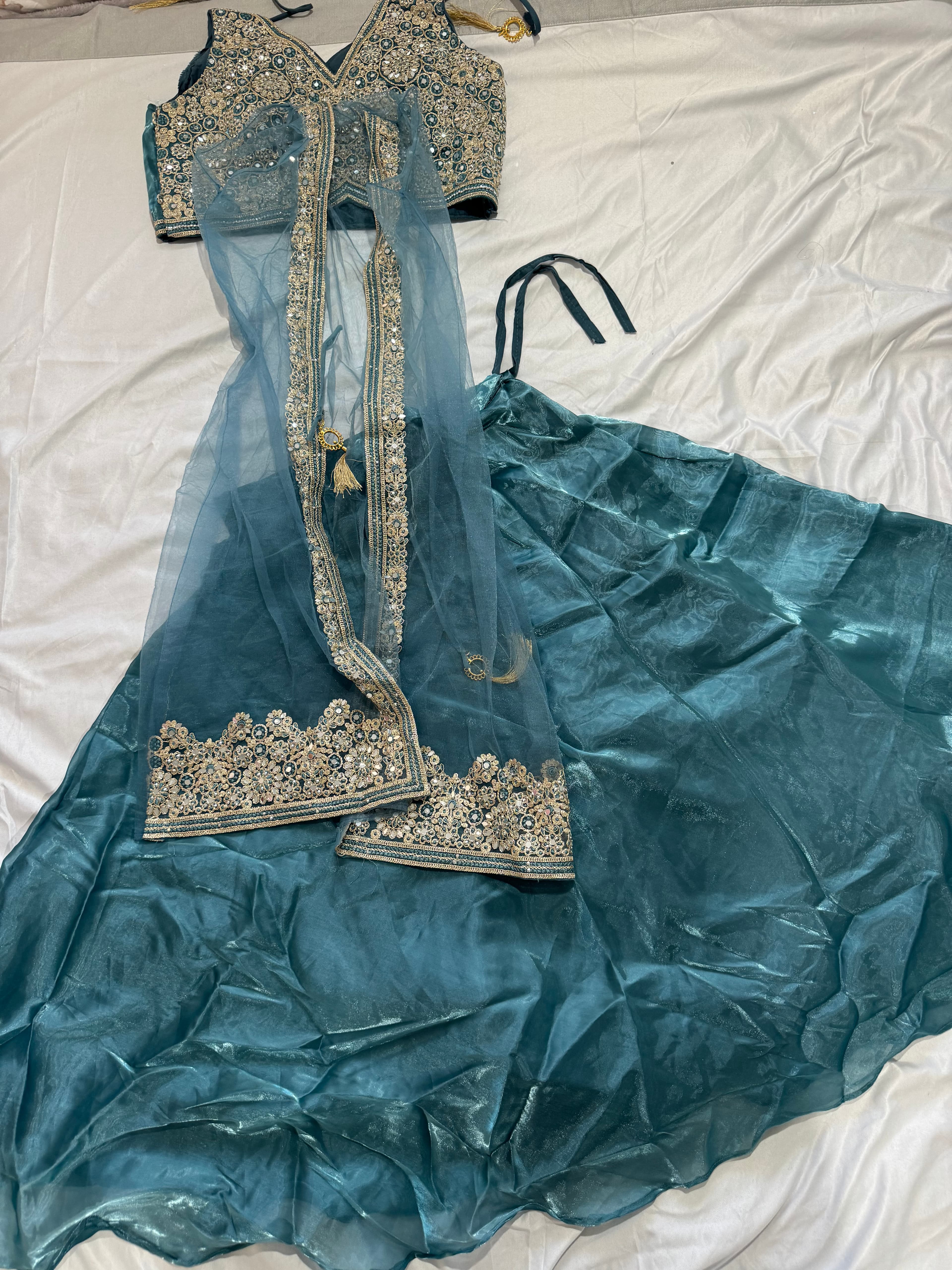 Stunning Teal Sequin & Thread Embroidered Lehenga Choli with Net coat