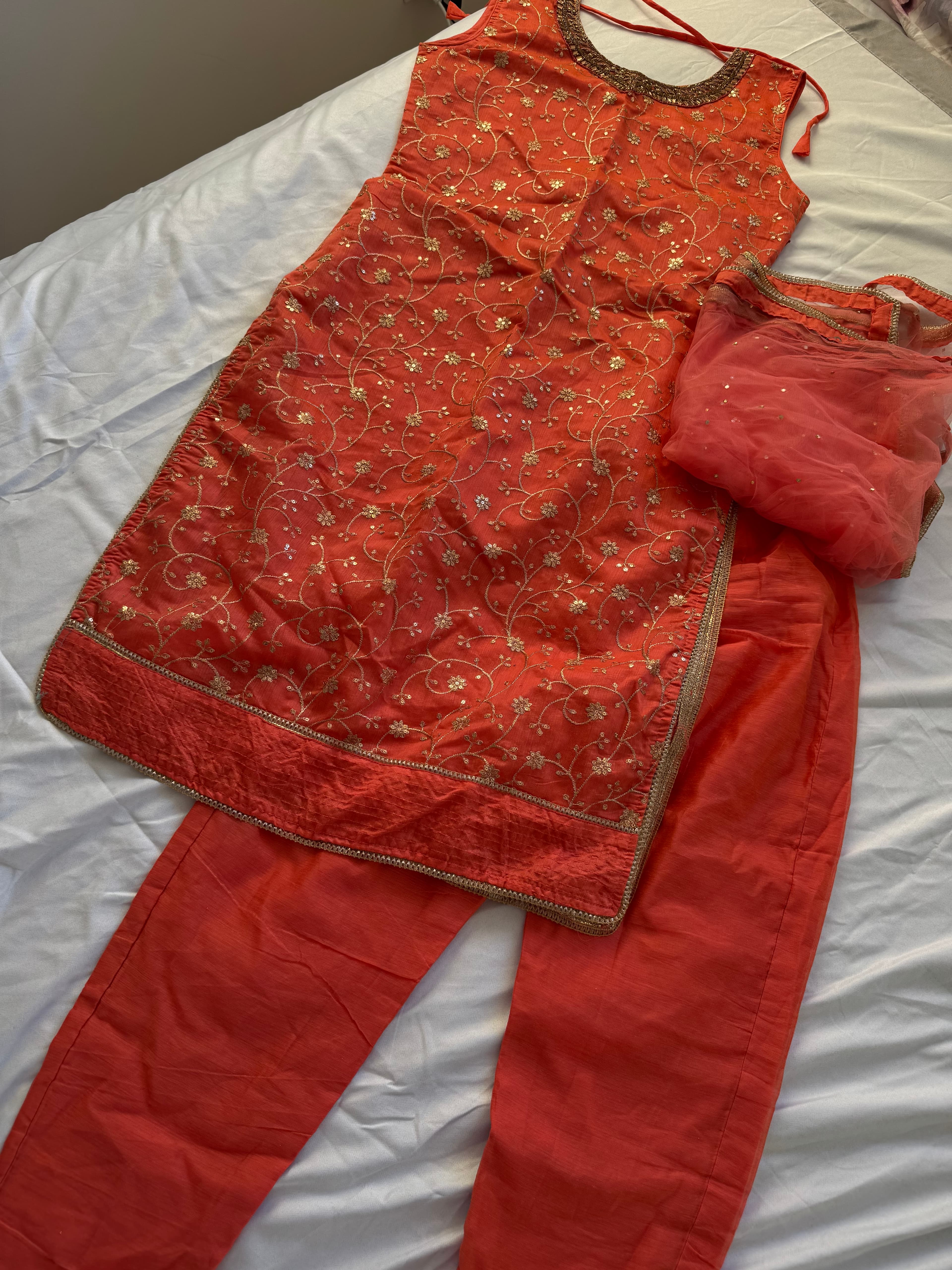 Vibrant Orange Salwar Suit with Gold Embroidery and Net Dupatta