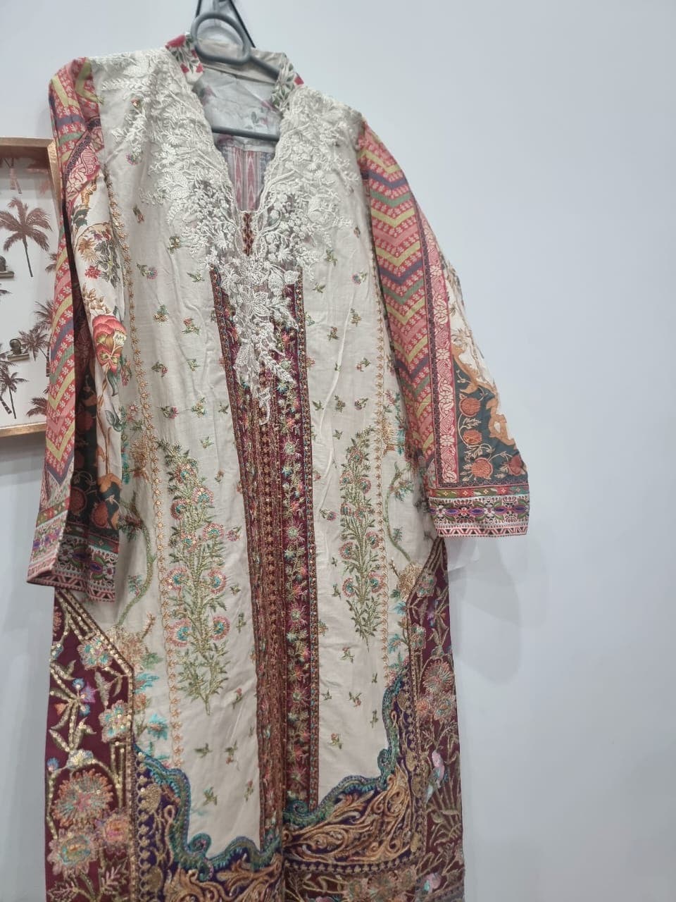 Elegant Embroidered Beige Salwar Suit with Floral and Paisley Motifs