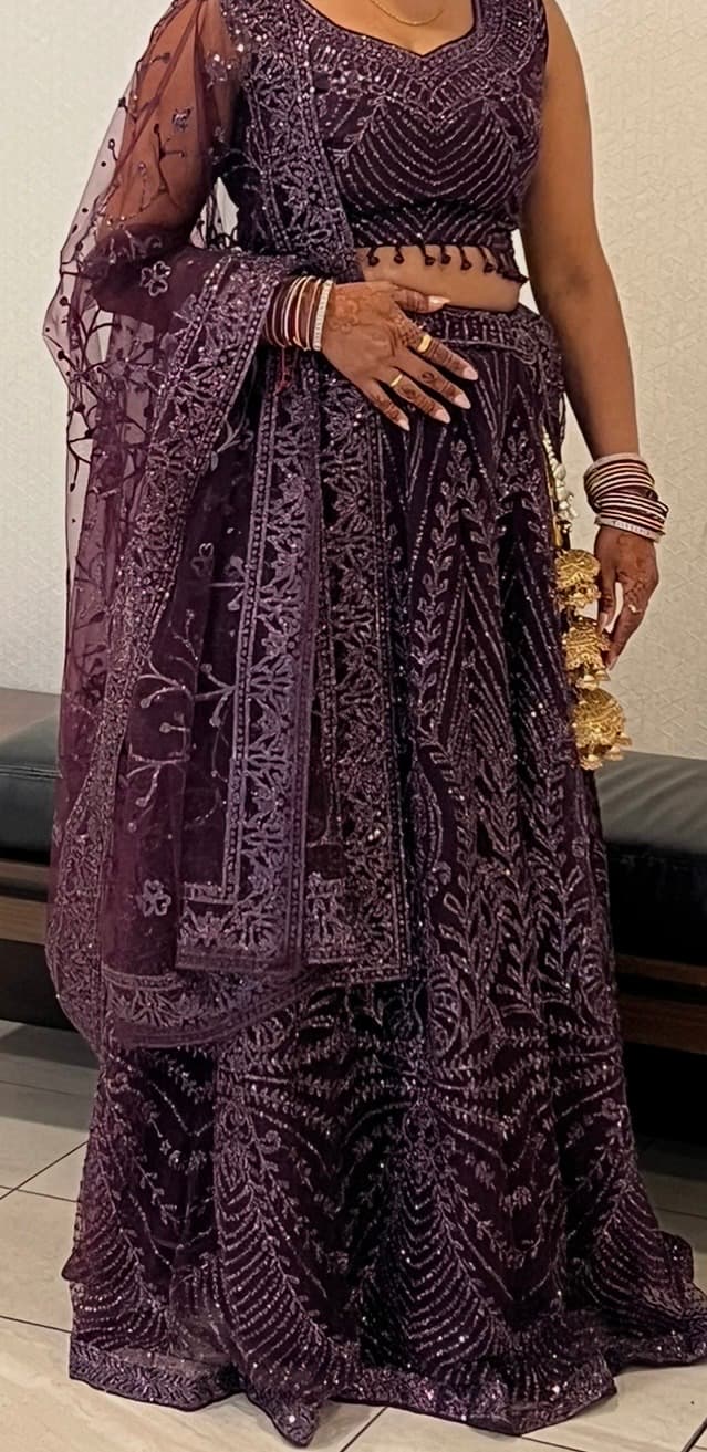 Stunning Plum Purple Sequin Embroidered Net Lehenga Choli Set