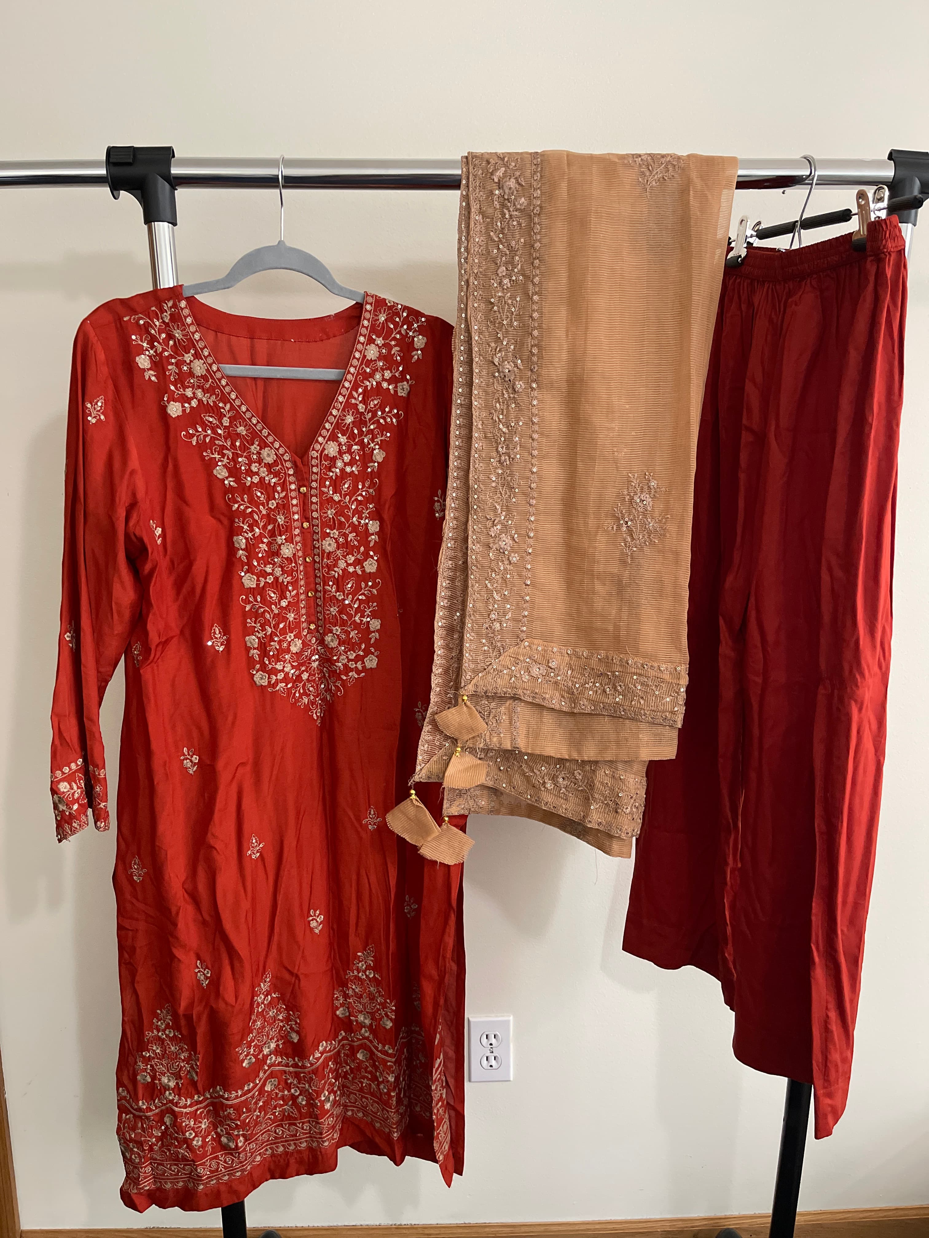 Elegant Rust Red Salwar Suit with Gold Embroidery and Beige Dupatta