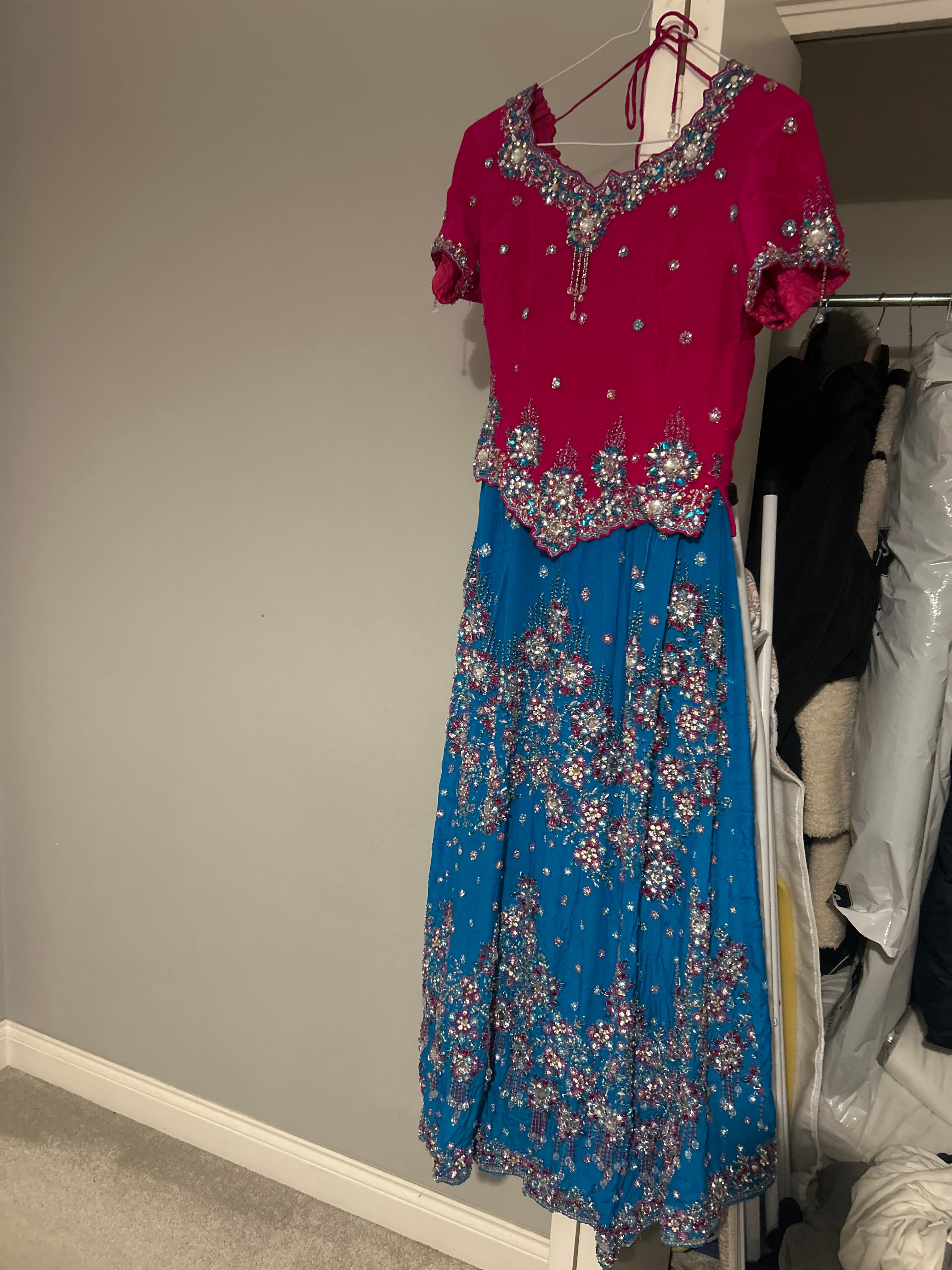 Vibrant Pink & Blue Heavily Embellished Lehenga Set