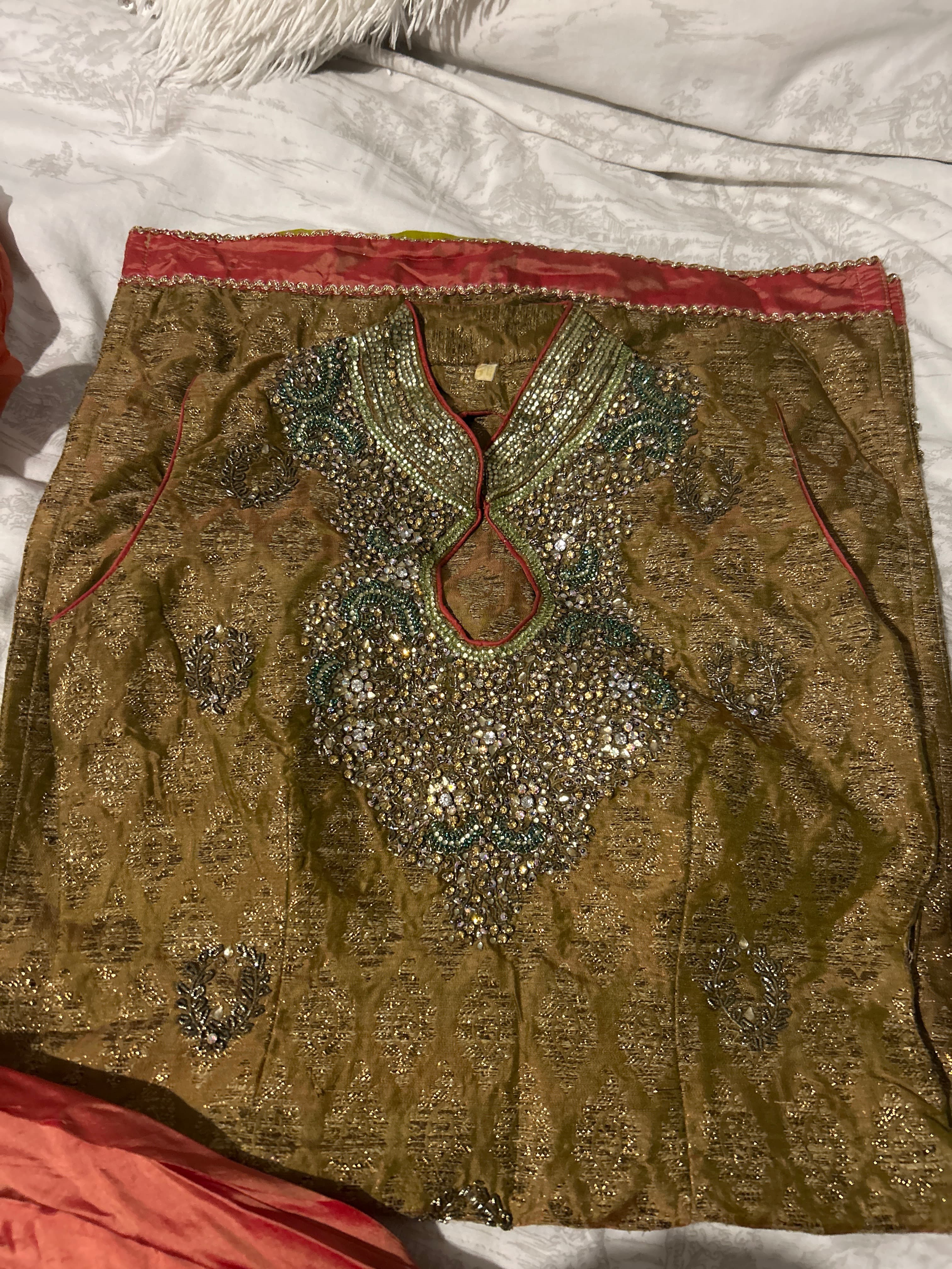 Elegant Gold Brocade Sleeveless suit with Intricate Sequin & Bead Work