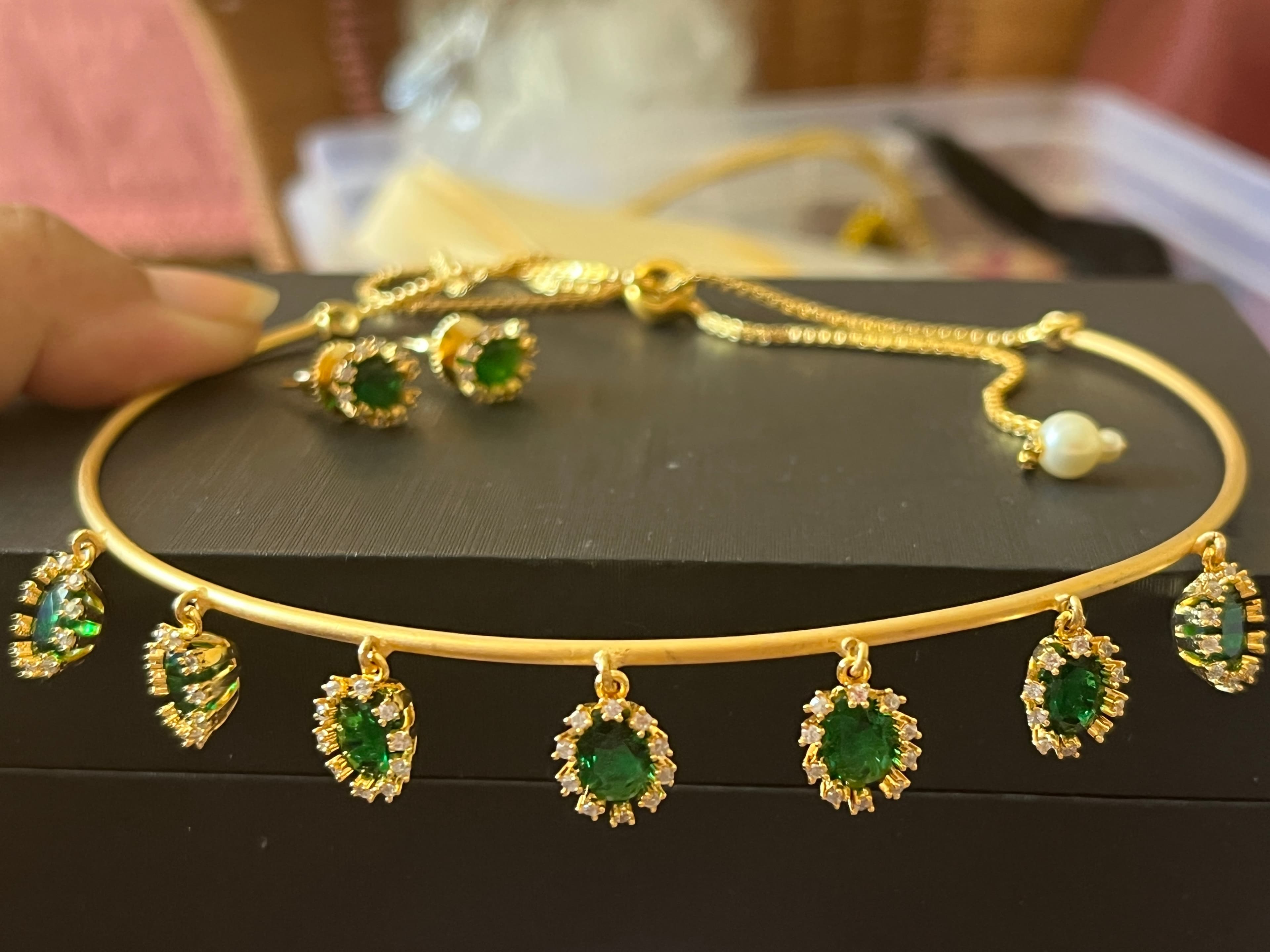 Elegant brass base golden Choker Necklace with Green Emerald-like Stones and Matching Stud Earrings