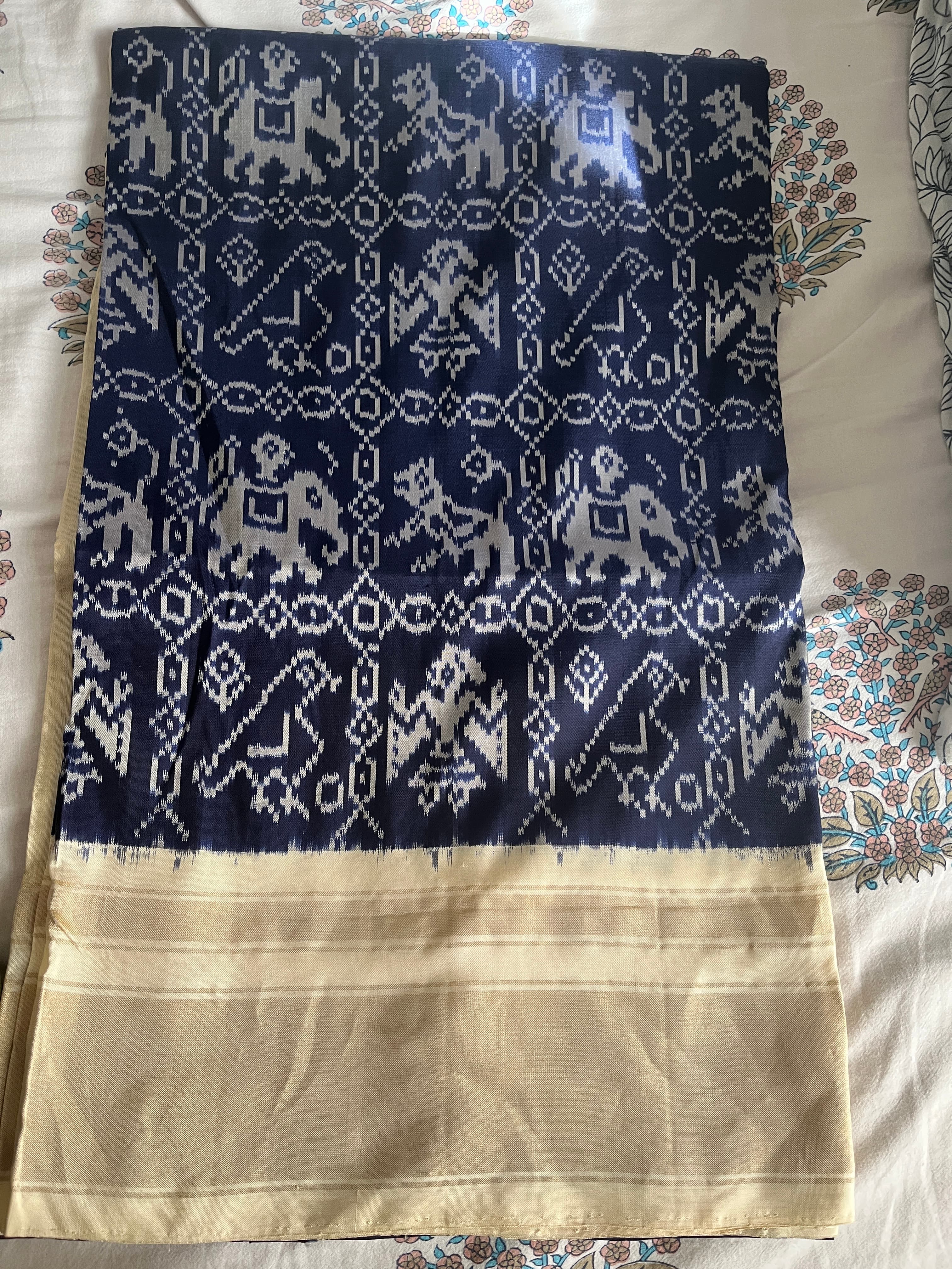 Elegant Navy Blue and Cream Ikat Saree with Elephant Motifs