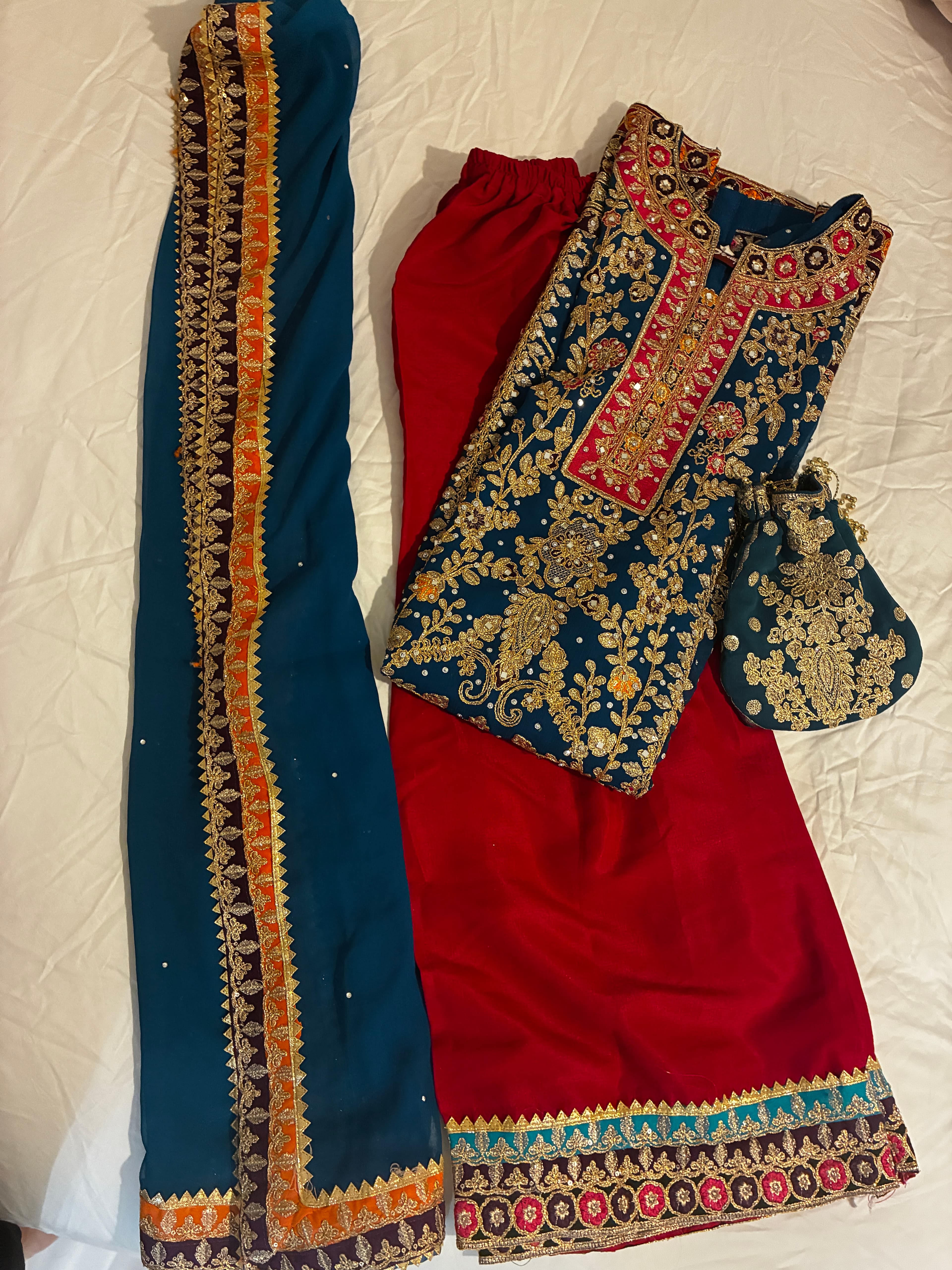 Stunning Teal & Red Heavy Embroidered Suit with Gold Work and Potli Bag