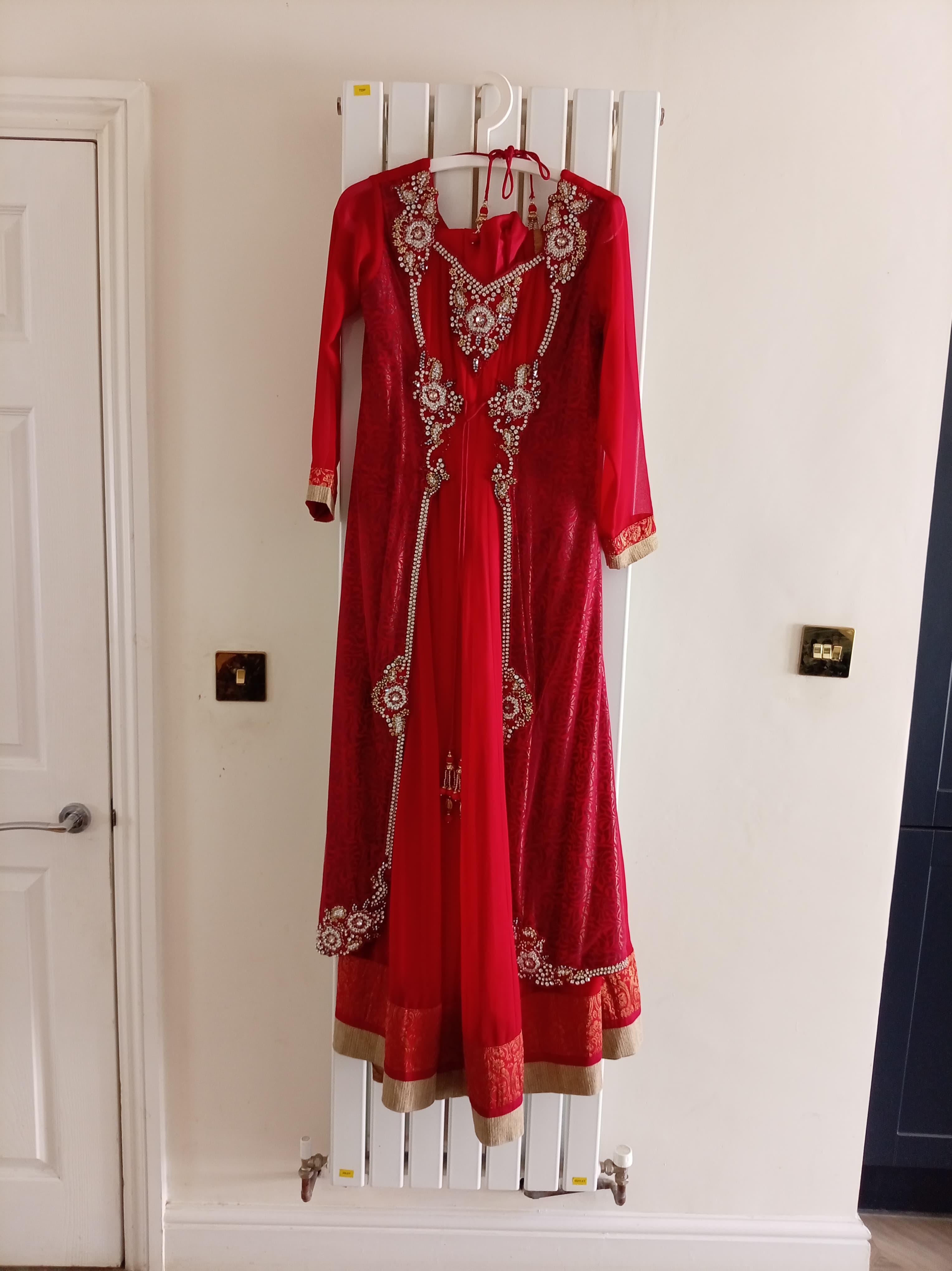A beautiful red Pakistani gown
