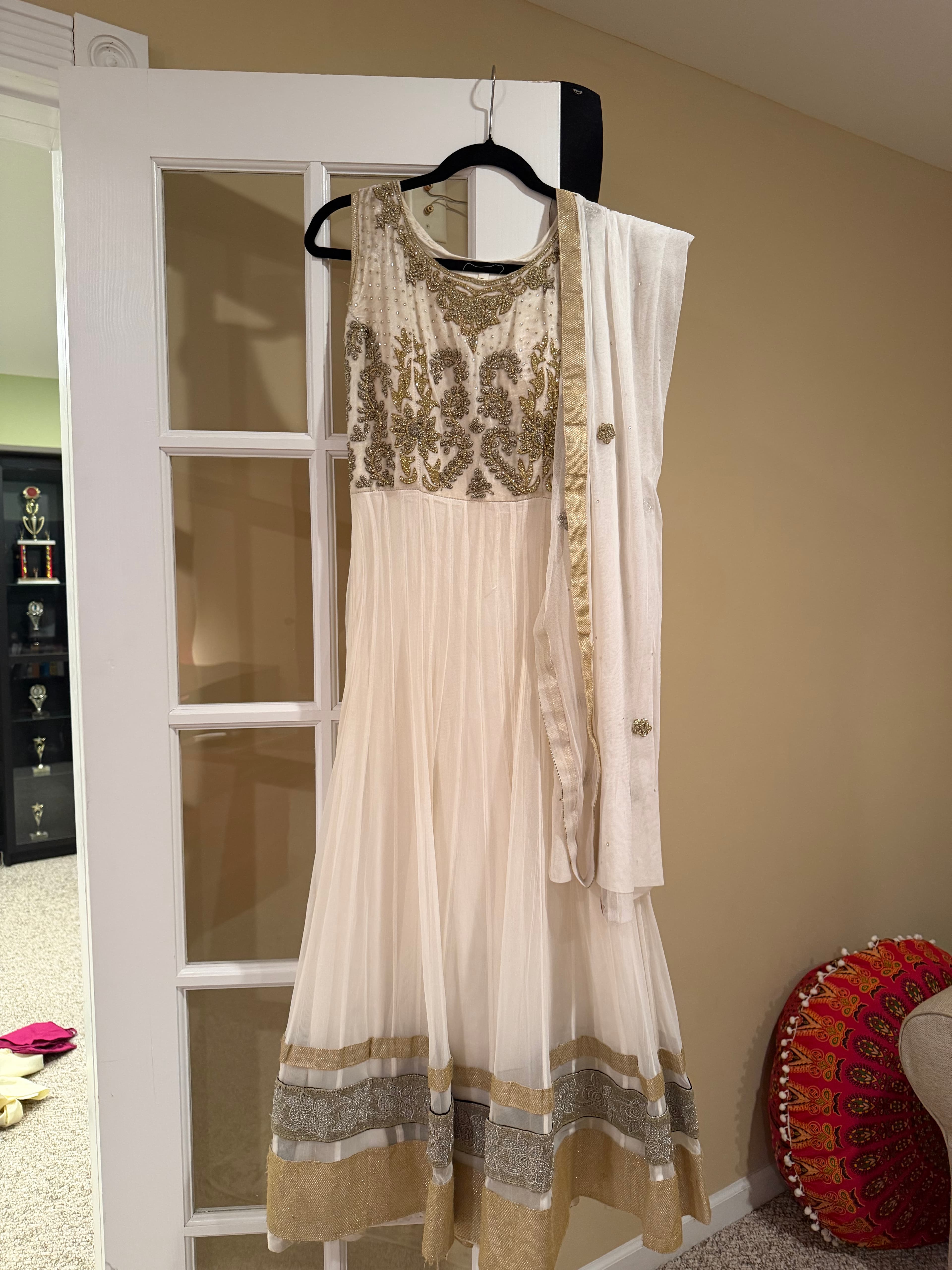 Elegant Cream Anarkali Suit with Gold and Silver Embroidery and Net Dupatta
