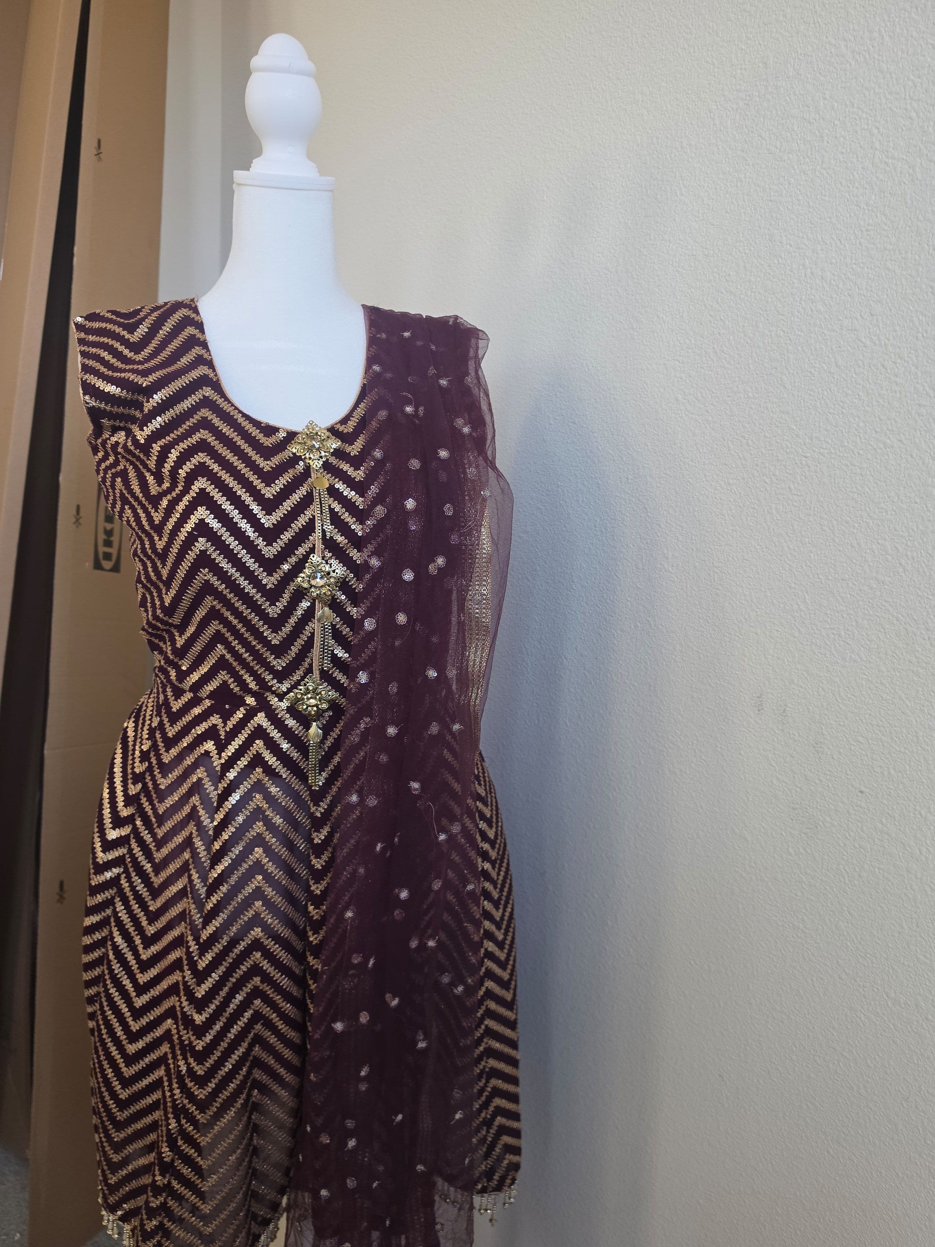 Elegant Maroon Sharara Suit with Gold Sequin Chevron and Net Dupatta