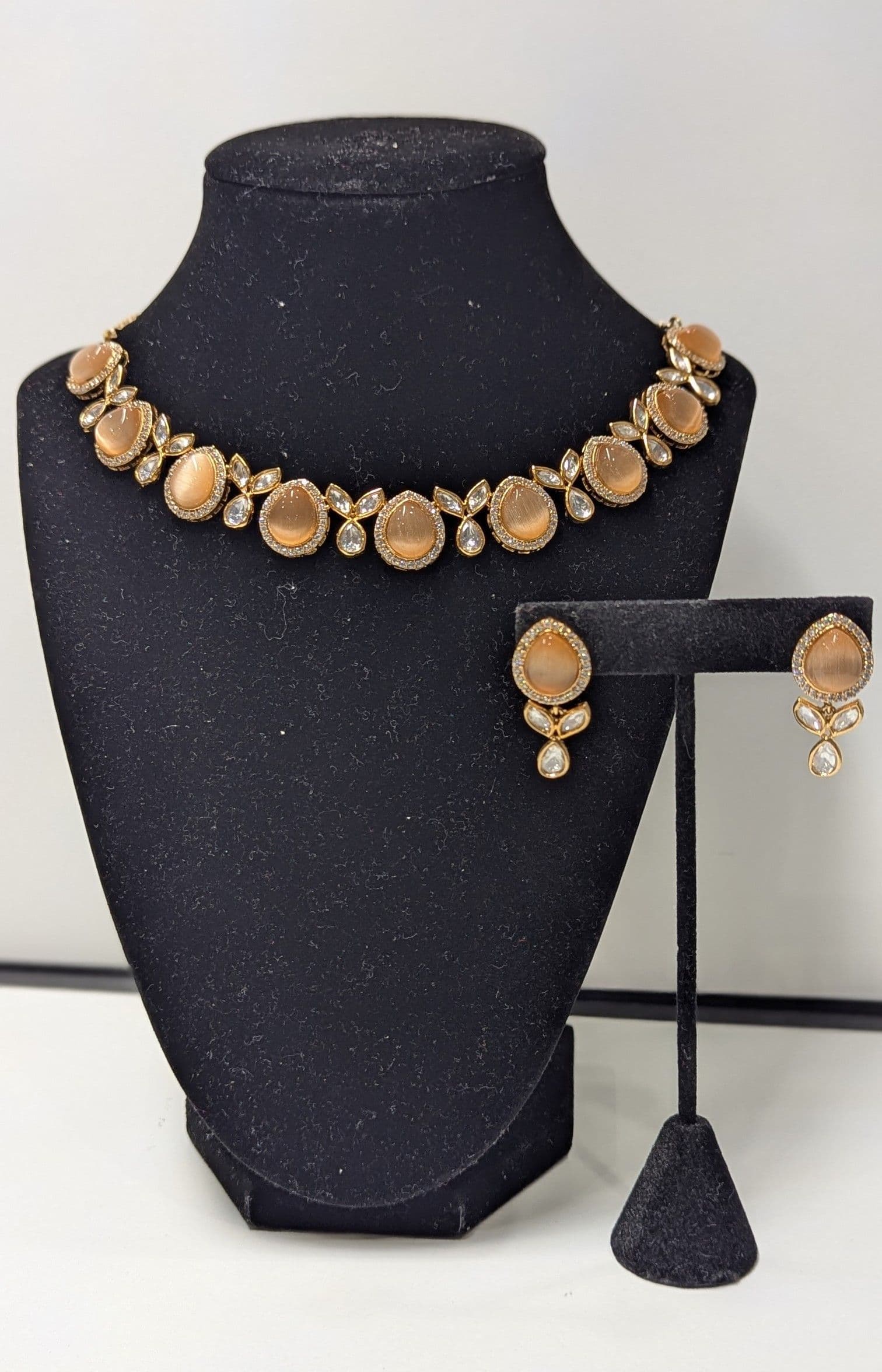 Premium Quality Elegant Gold-Toned Necklace Set with Peach Stones and Kundan Accents