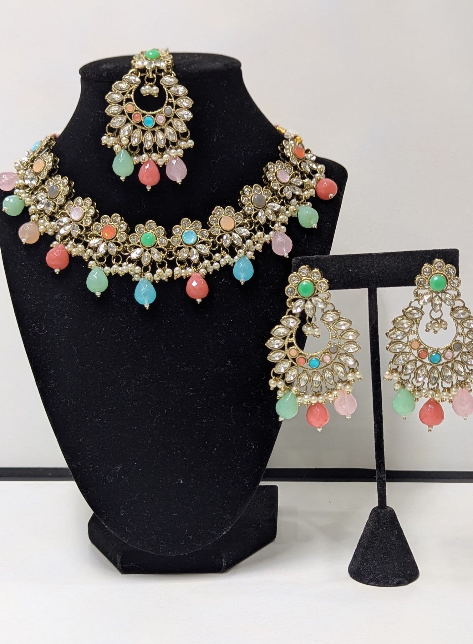 Elegant Gold-Toned Kundan & Pearl Necklace Set with Pastel Drops - Includes Earrings & Maang Tika